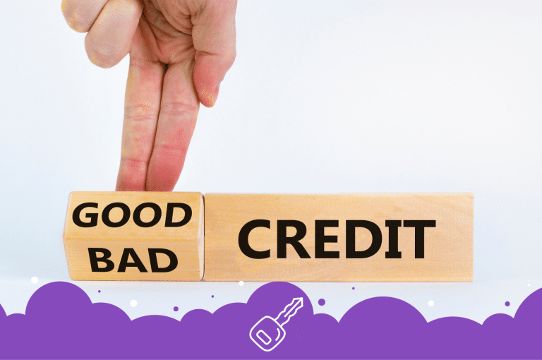 Photo of a person flipping over a piece of wood that goes from good to bad credit.