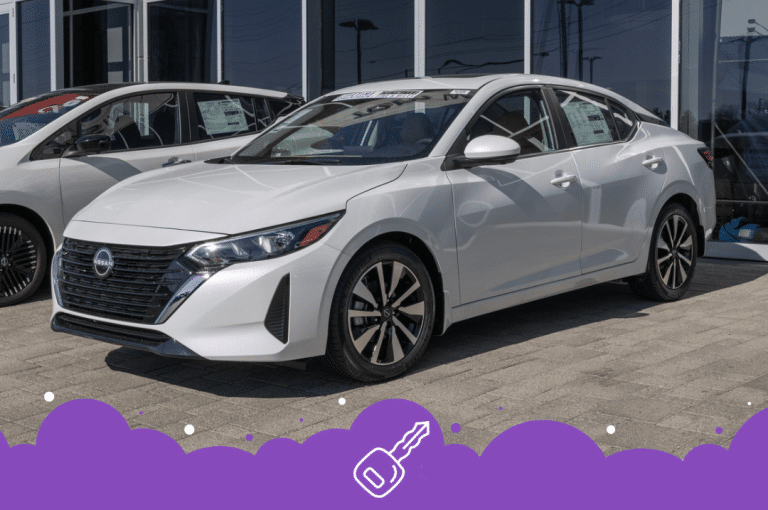 a white car parked in a lot