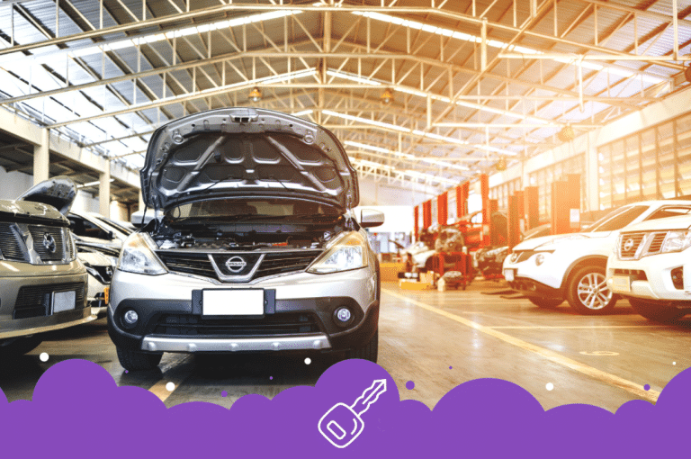 a car with the hood open in a garage