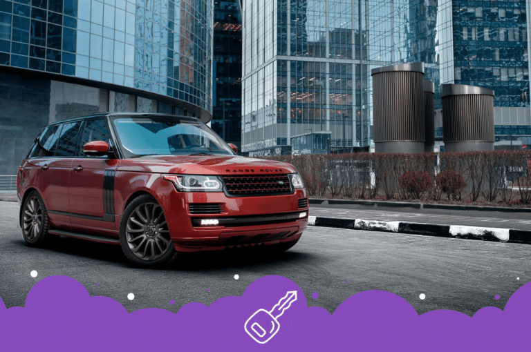 a red car parked in front of a building