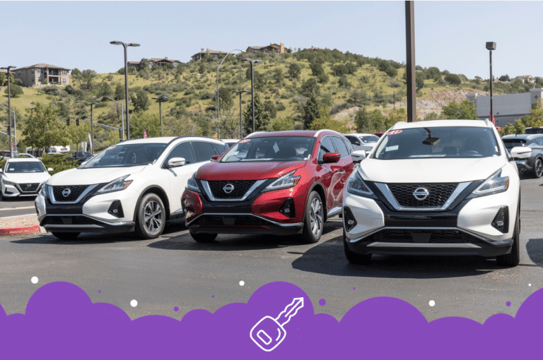 a group of cars parked in a parking lot