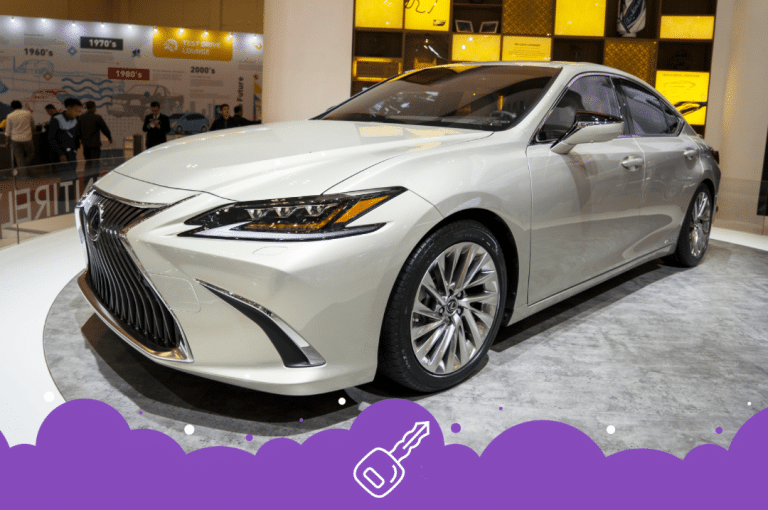 a white car parked in a room