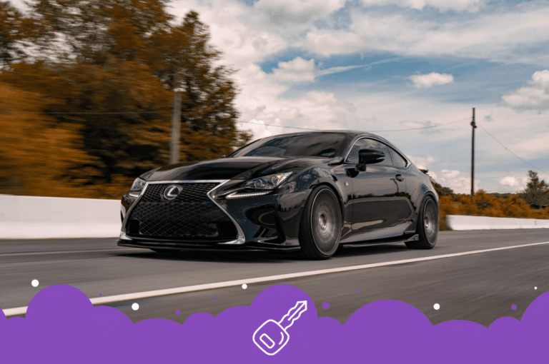 a black sports car on a road