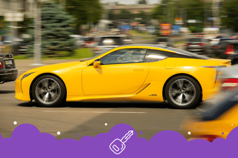 a yellow sports car on the road