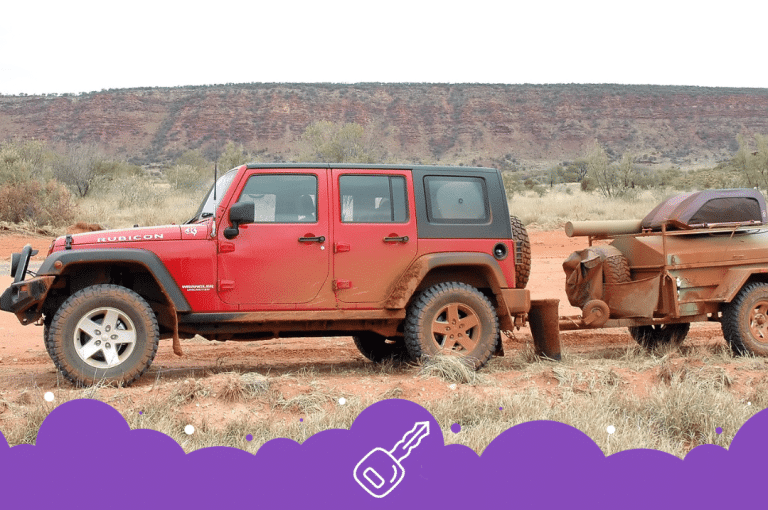 Red Jeep wrangler towing