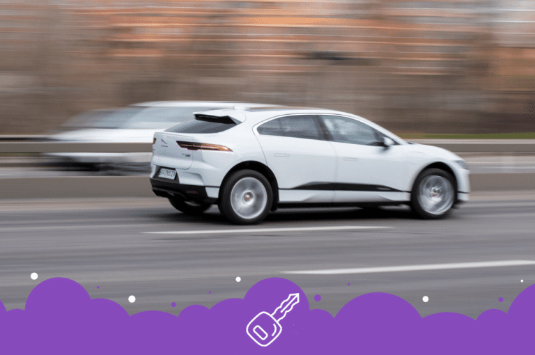White jaguar I pace moving on the street
