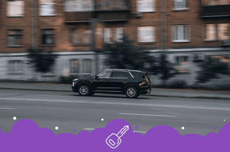 Black Hyundai palisade moving on the street