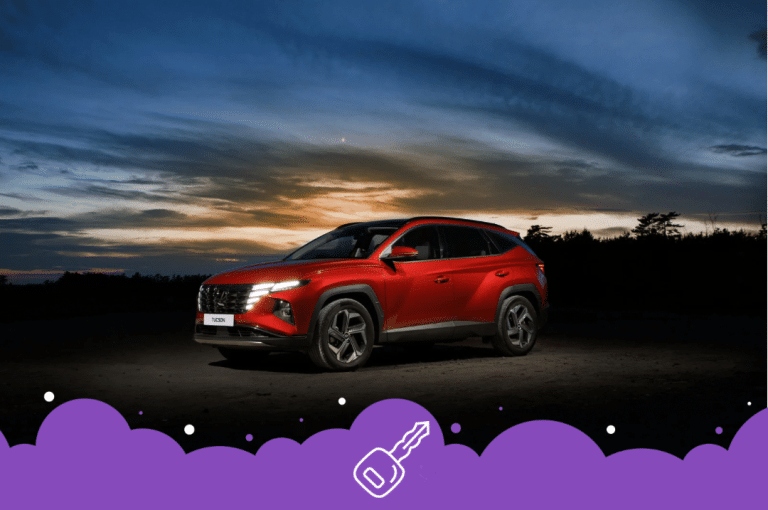 Red Hyundai Tucson in the dark