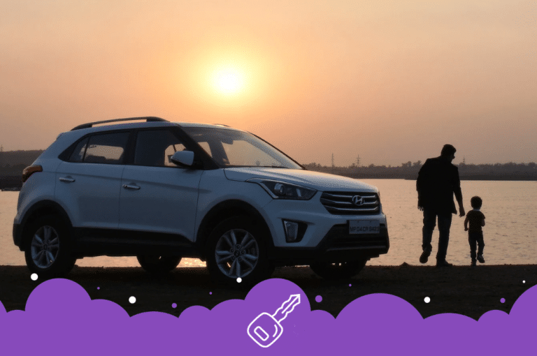 Hyundai suv with parent and child during a sunset