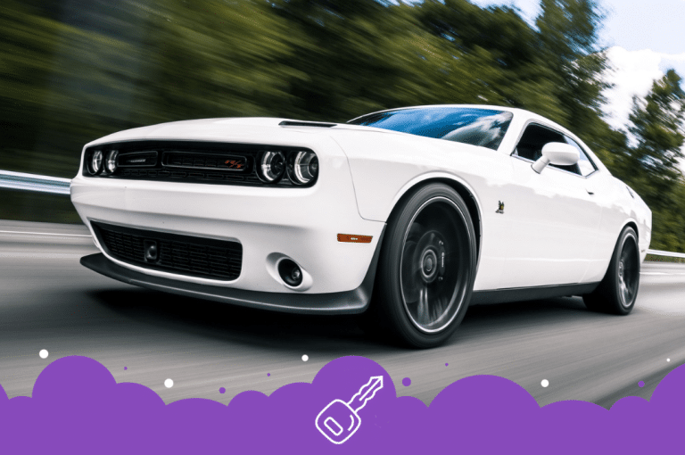 White dodge charger driving