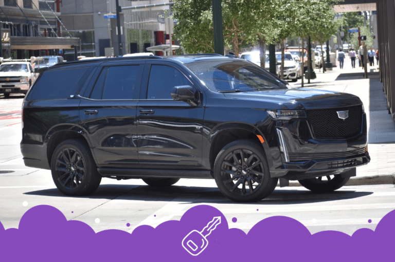 Black Cadillac escalade driving