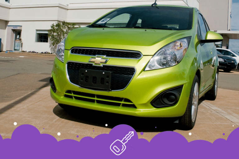 Green Chevy spark at dealer