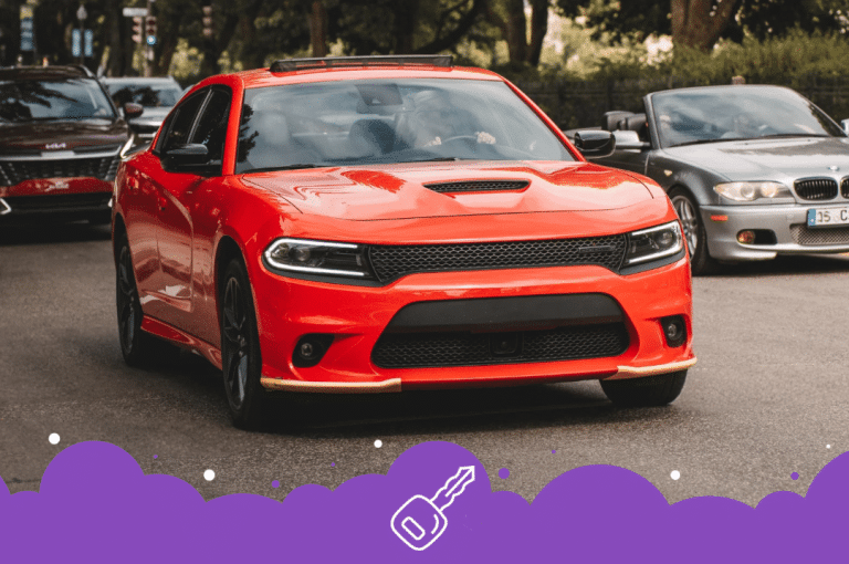 Red dodge charger on the road