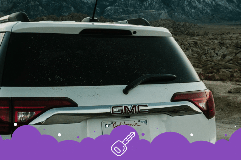 Back of white gmc acadia