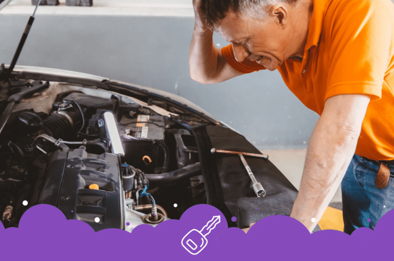 Old dude looking at engine