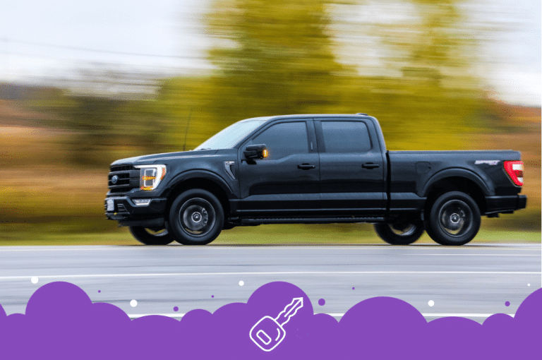 Black ford f150 driving blur background