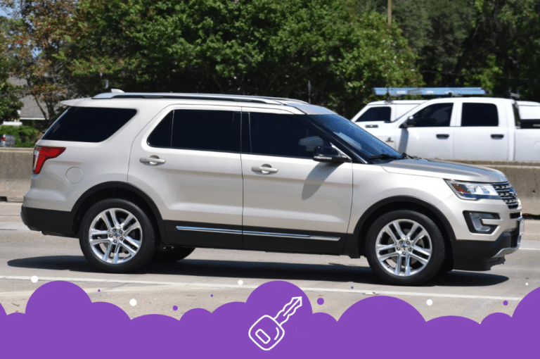 White ford explorer driving on road