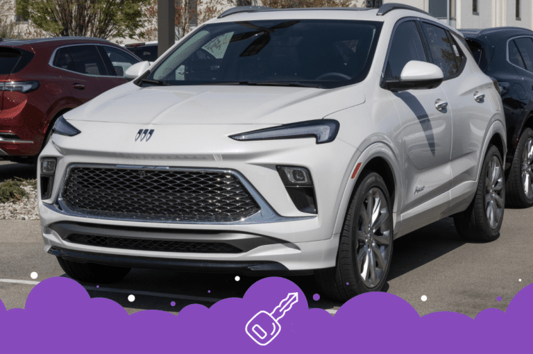 White Buick envista parked