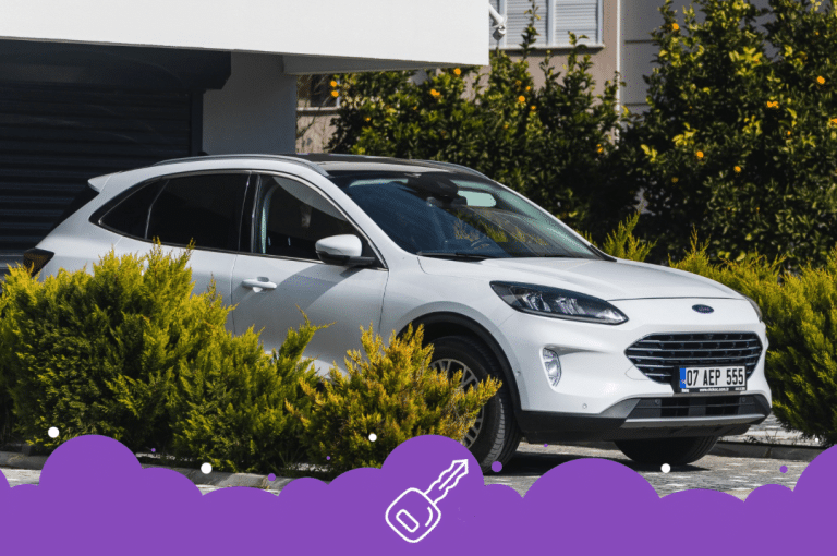White ford escape parked on driveway