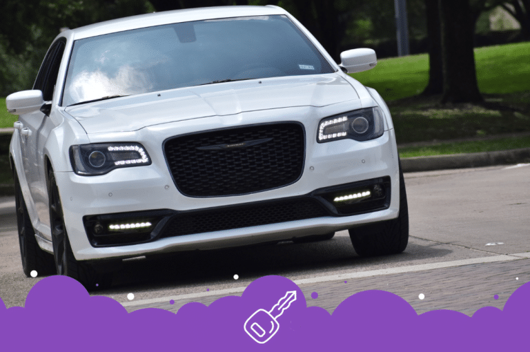 New white Chrysler 300 driving