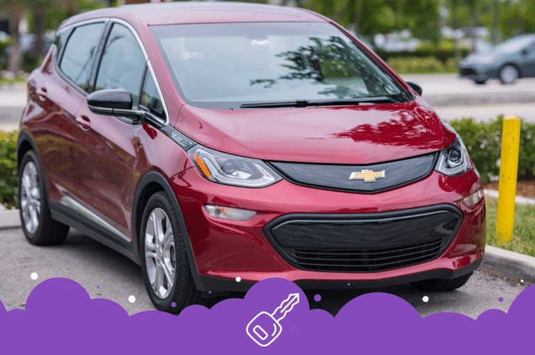 Red Chevy bolt parked