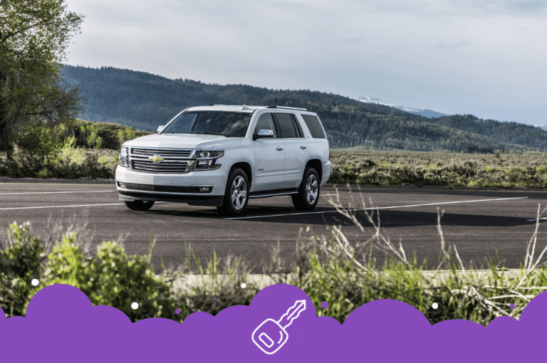 White Chevy Tahoe in Yellowstone parked