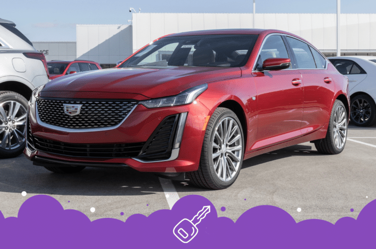 Red ct5 parked in a parking lot