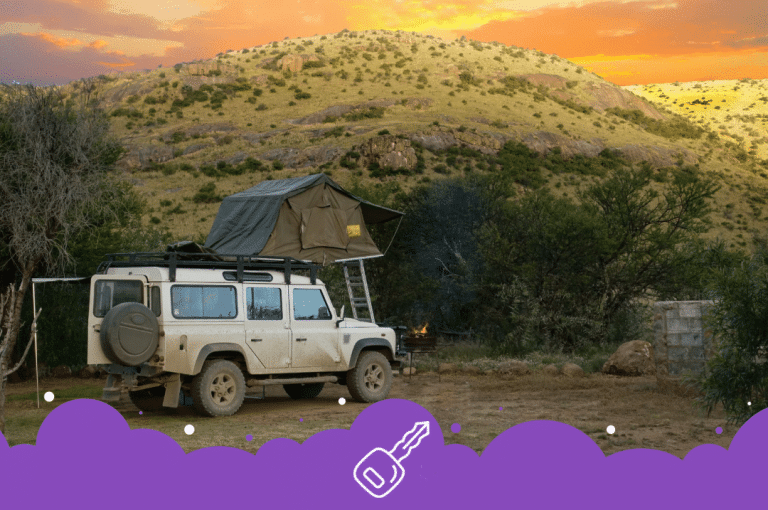 White Land Rover defender camping