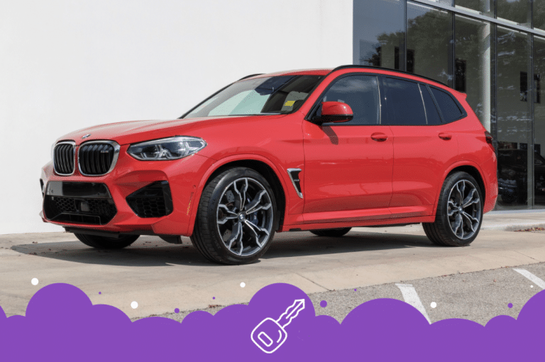 Red bmw x3 parked outside dealership