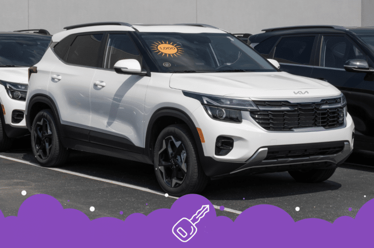 White Kia seltos at dealer