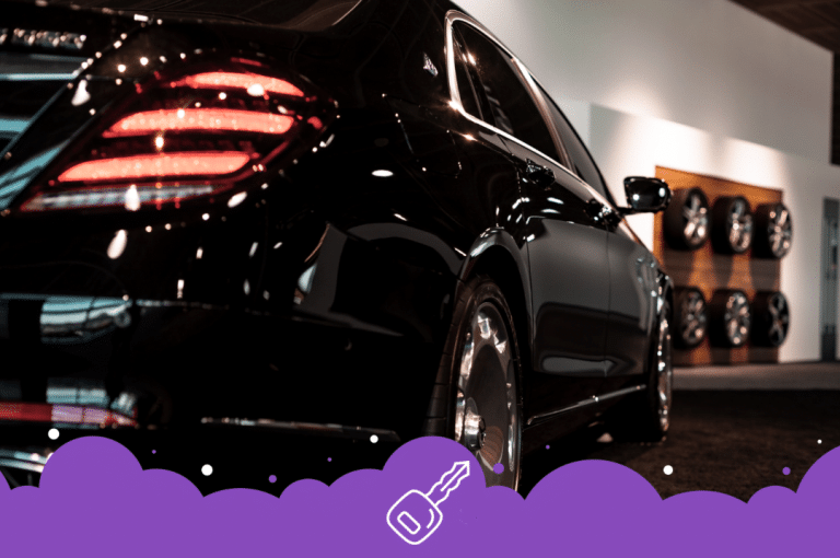 Side back shot of black Mercedes car