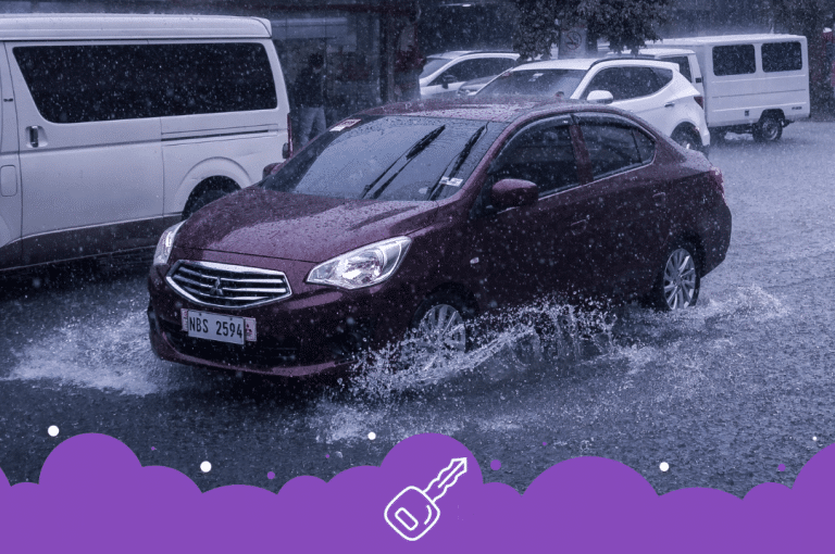 Mitsubishi mirage plowing through flood