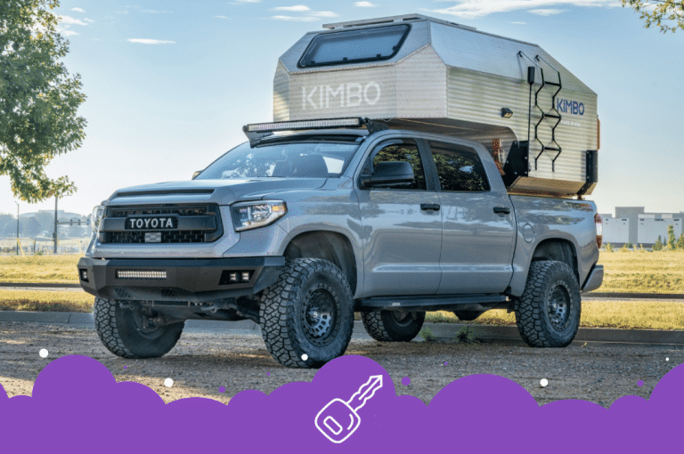 Grey Toyota Tacoma with camping gear