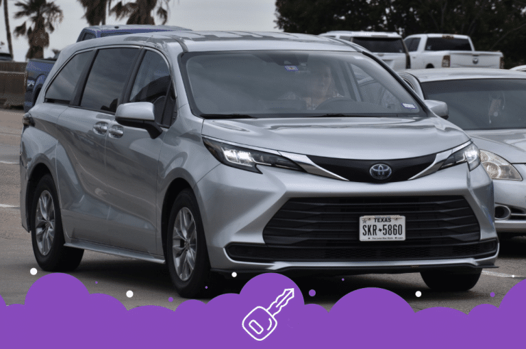 Silver Toyota sienna driving