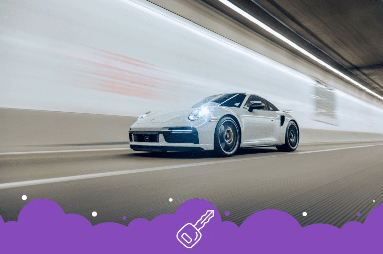 White Porsche 911 driving