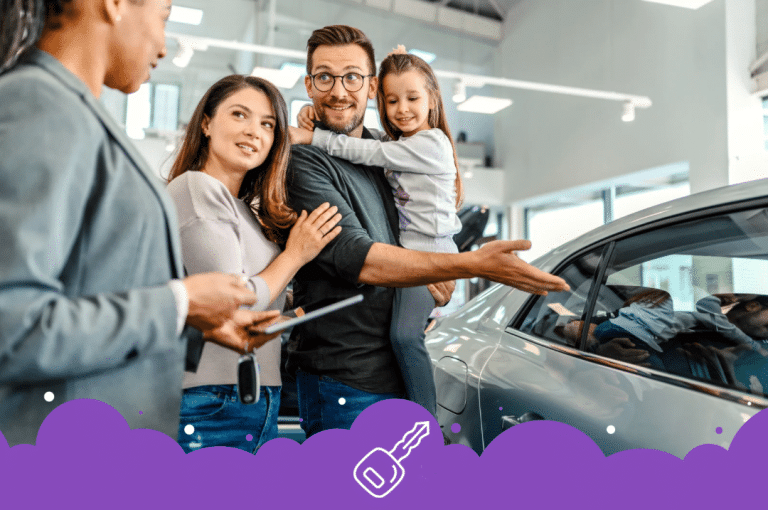 Parents with small kid shopping for a car